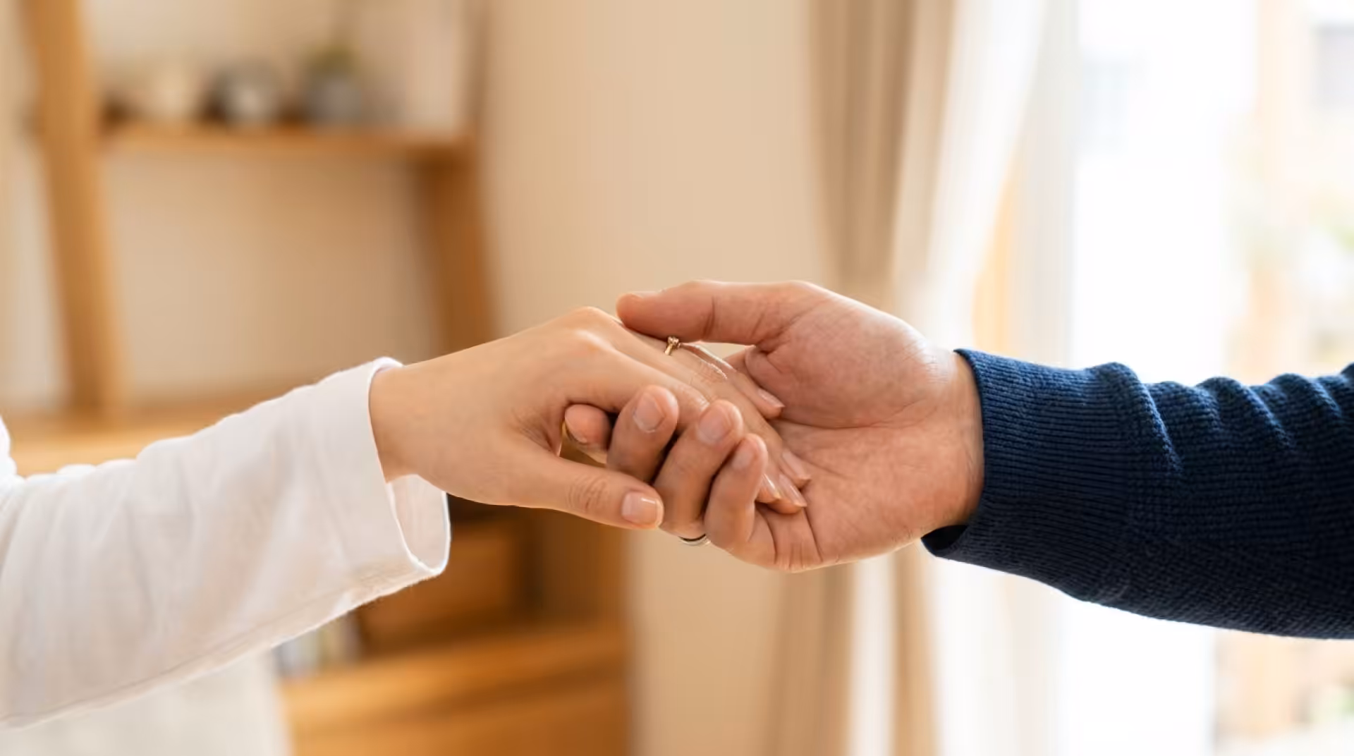 couple holding their hands